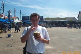 Enjoying a coconut